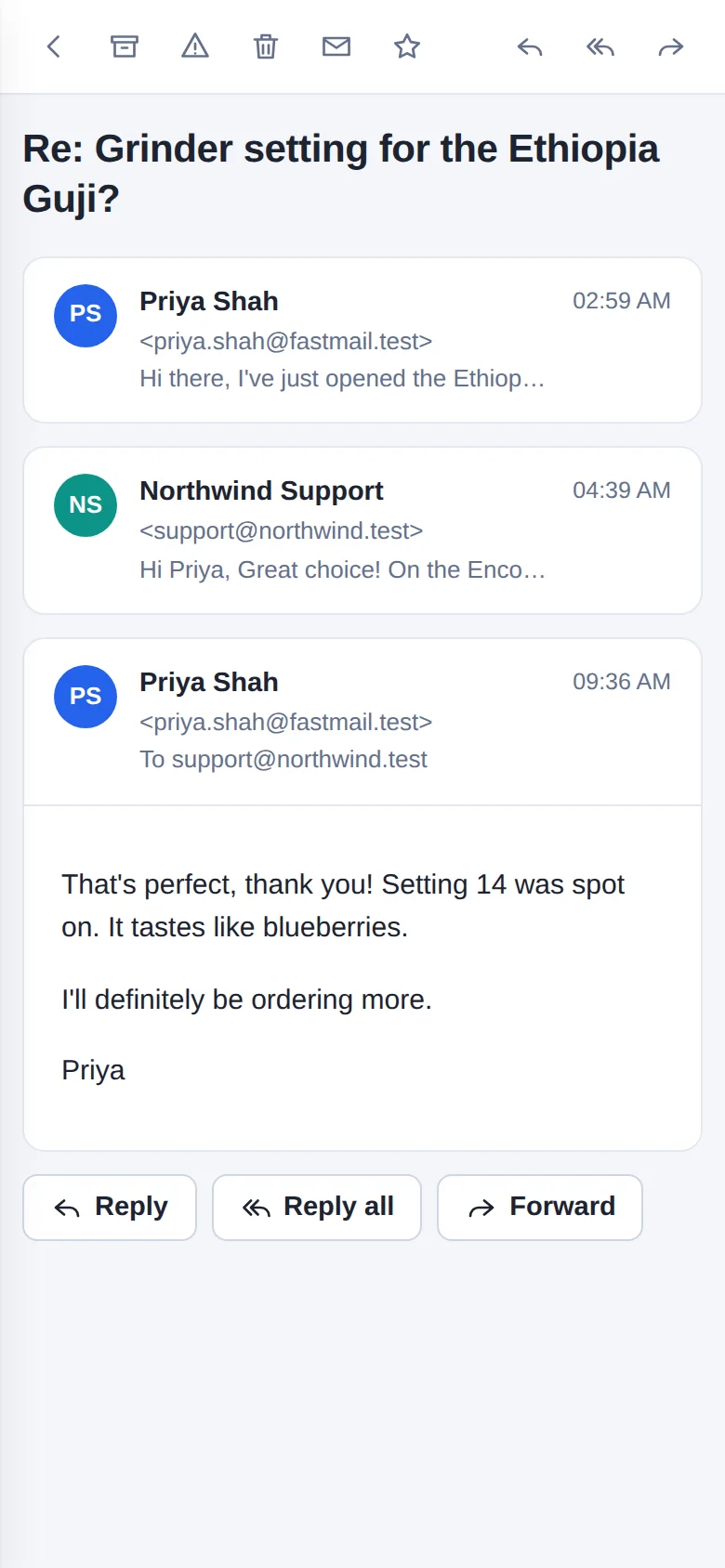 A conversation open on a phone, with Reply, Reply all and Forward buttons.